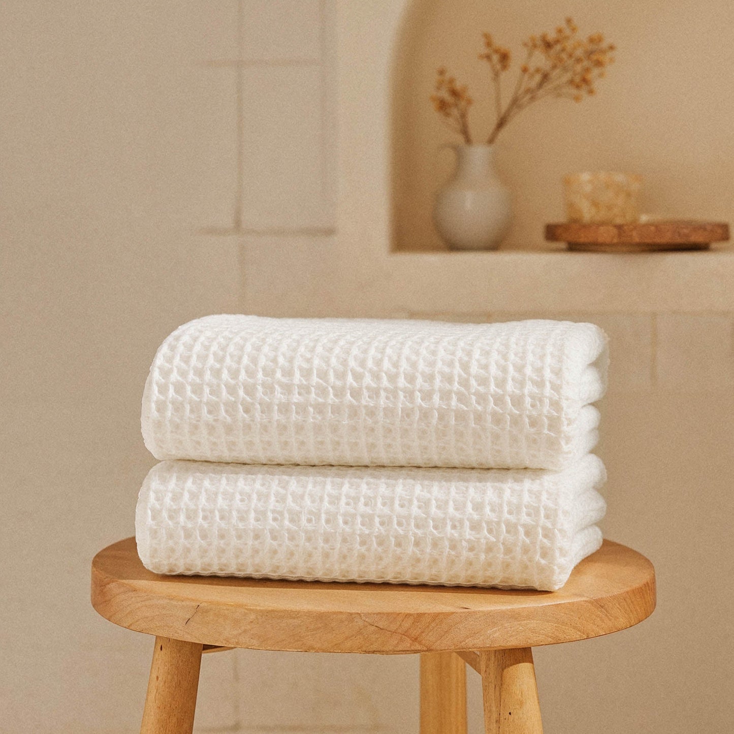 Sedona waffle towel set in coordinated colors stacked on shelf