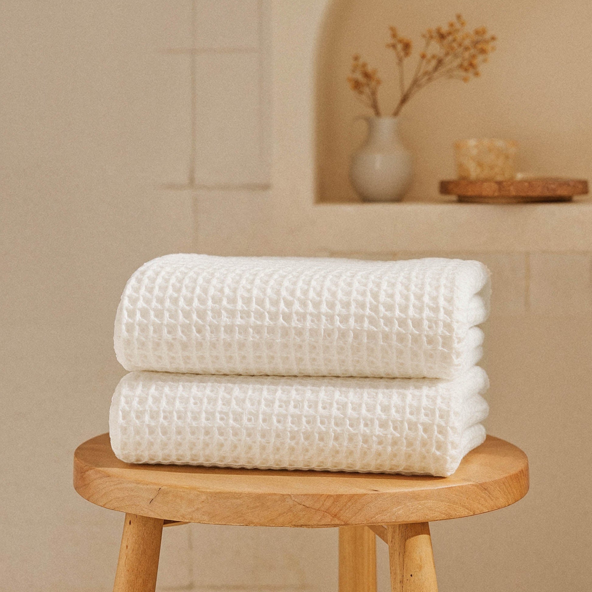 Sedona waffle towel set in coordinated colors stacked on shelf