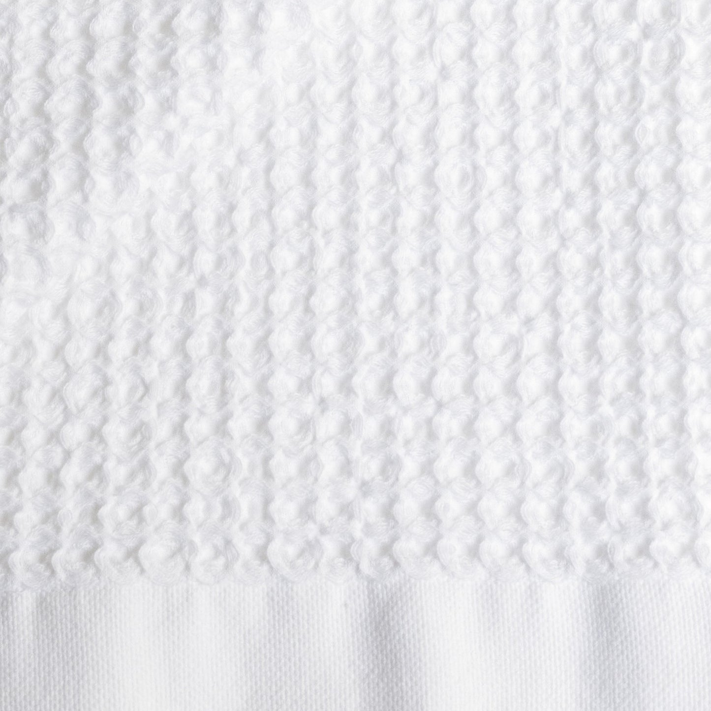 Sedona waffle towel draped on chair showing relaxed cotton drape