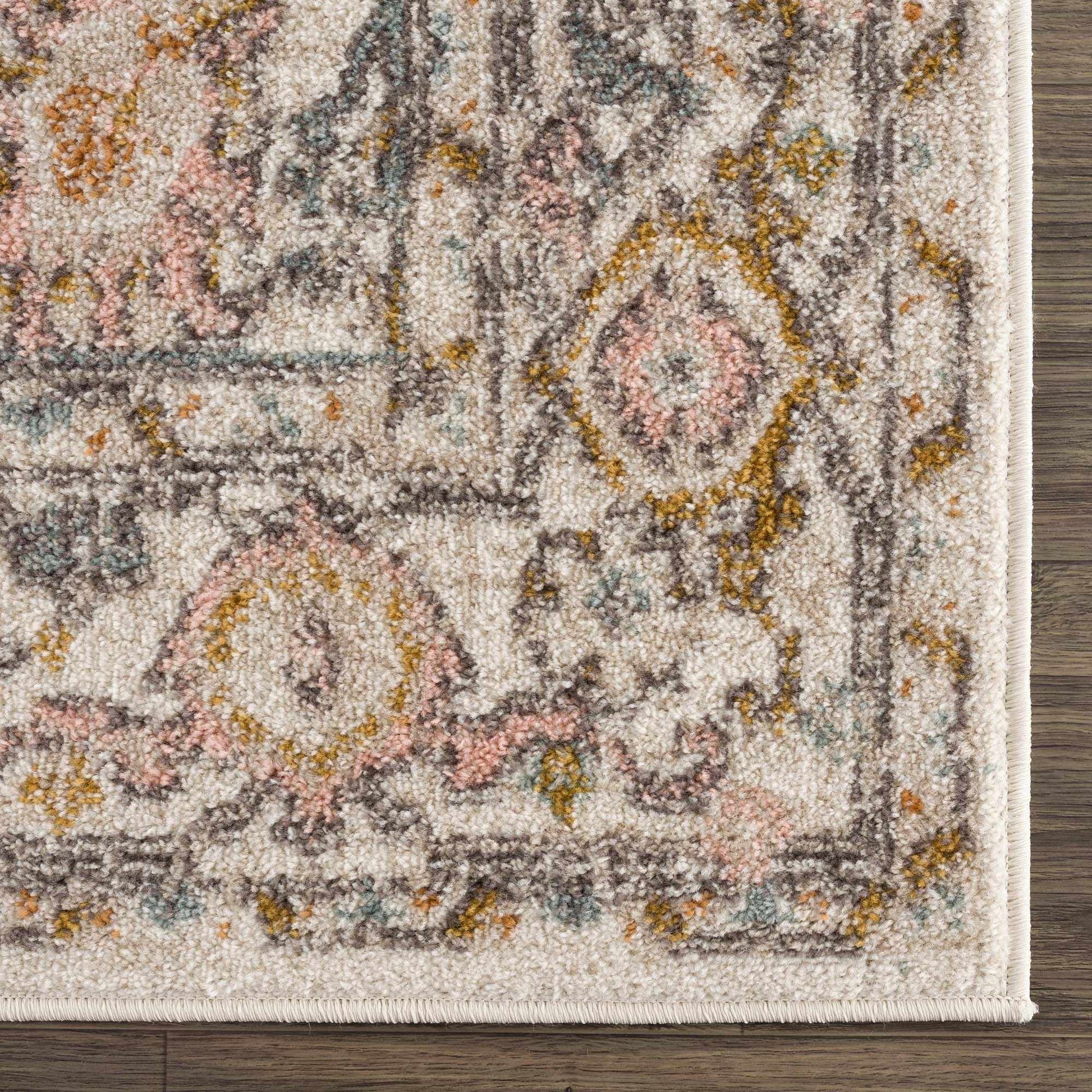 Lifestyle photo of Herstmonceux rug grounding a styled dining nook