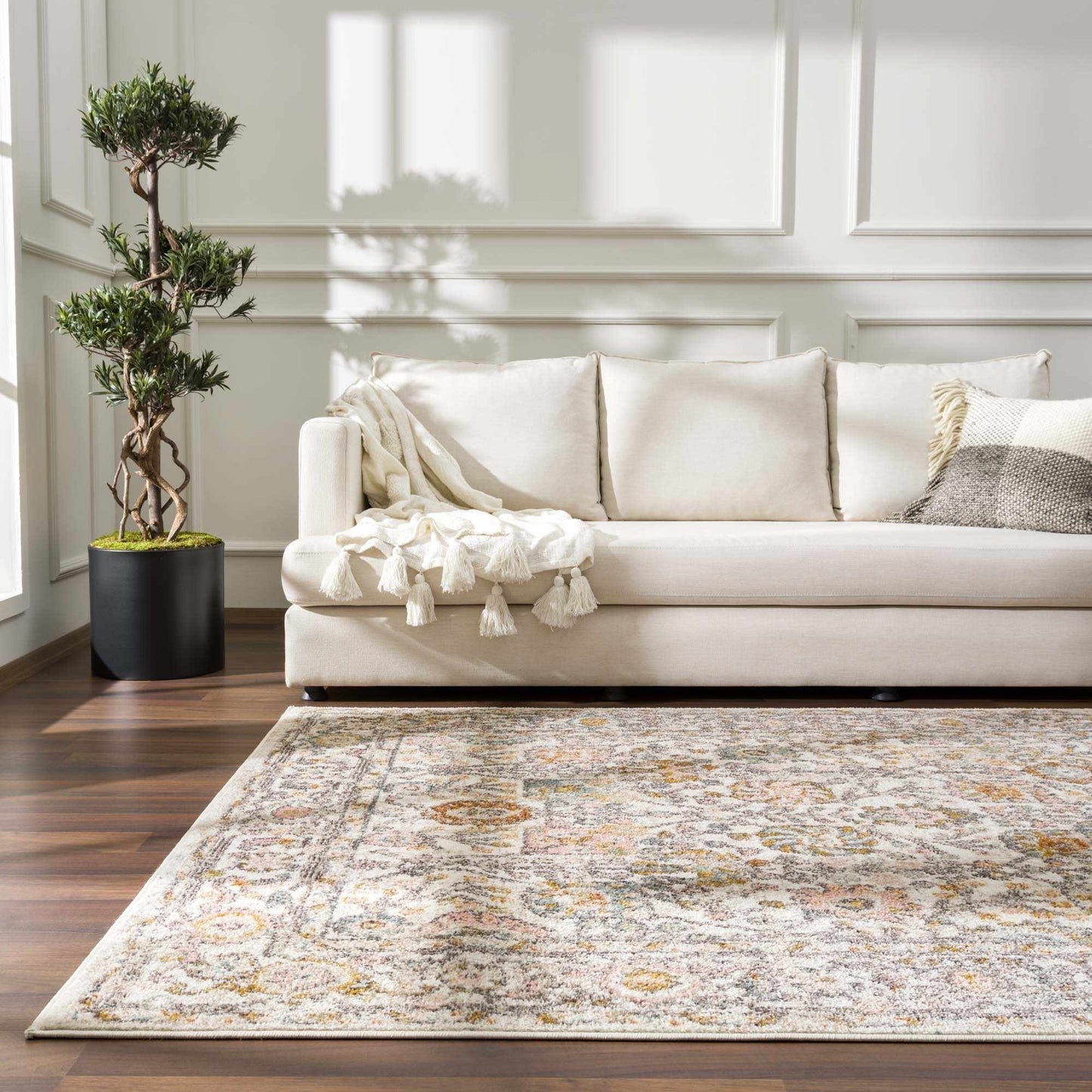 Herstmonceux rug photographed top-down with surrounding hardwood floor visible