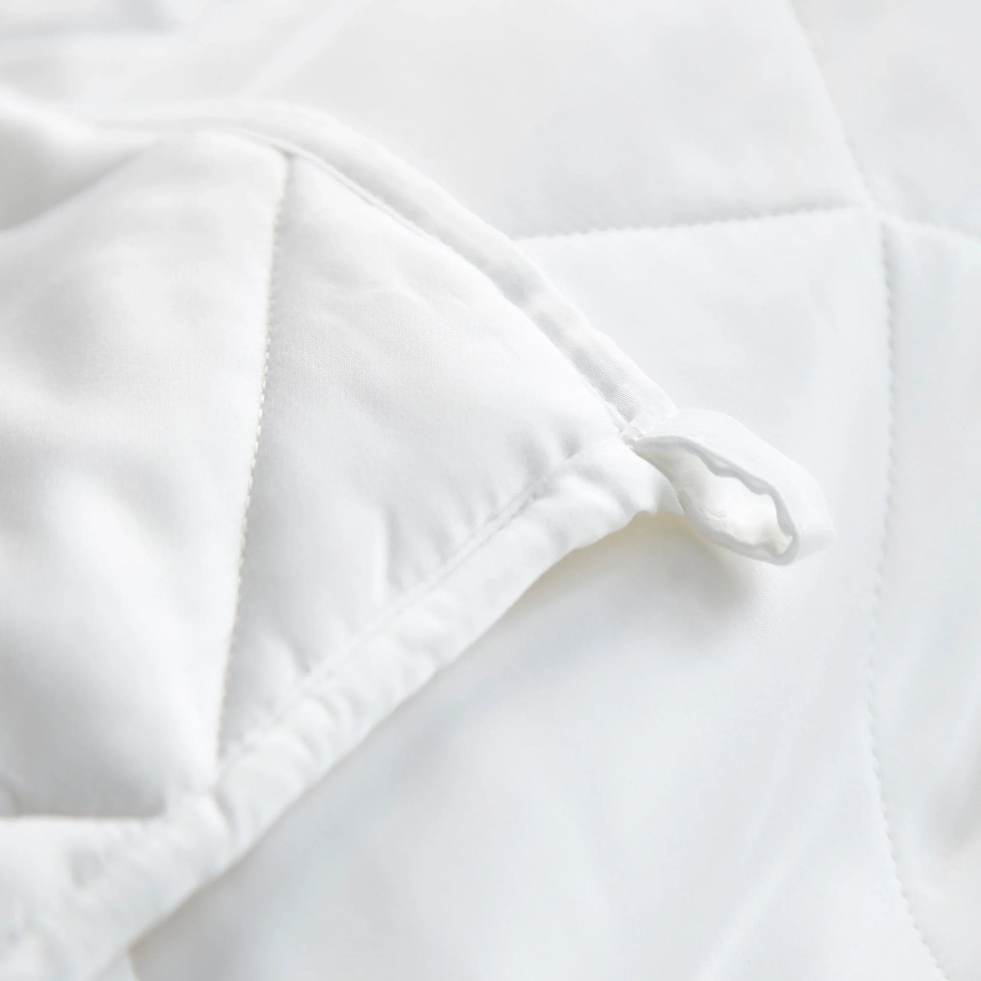 Branded zip pouch packaging for the bamboo duvet comforter on white background