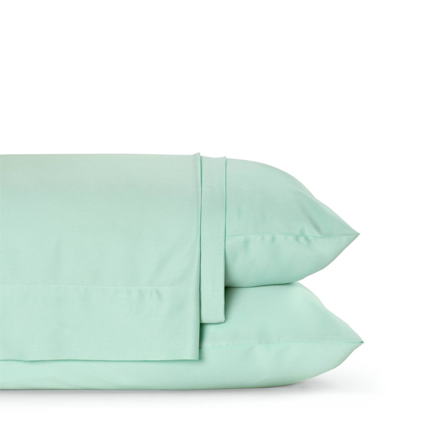 Folded bamboo viscose sheet set in white photographed neatly stacked