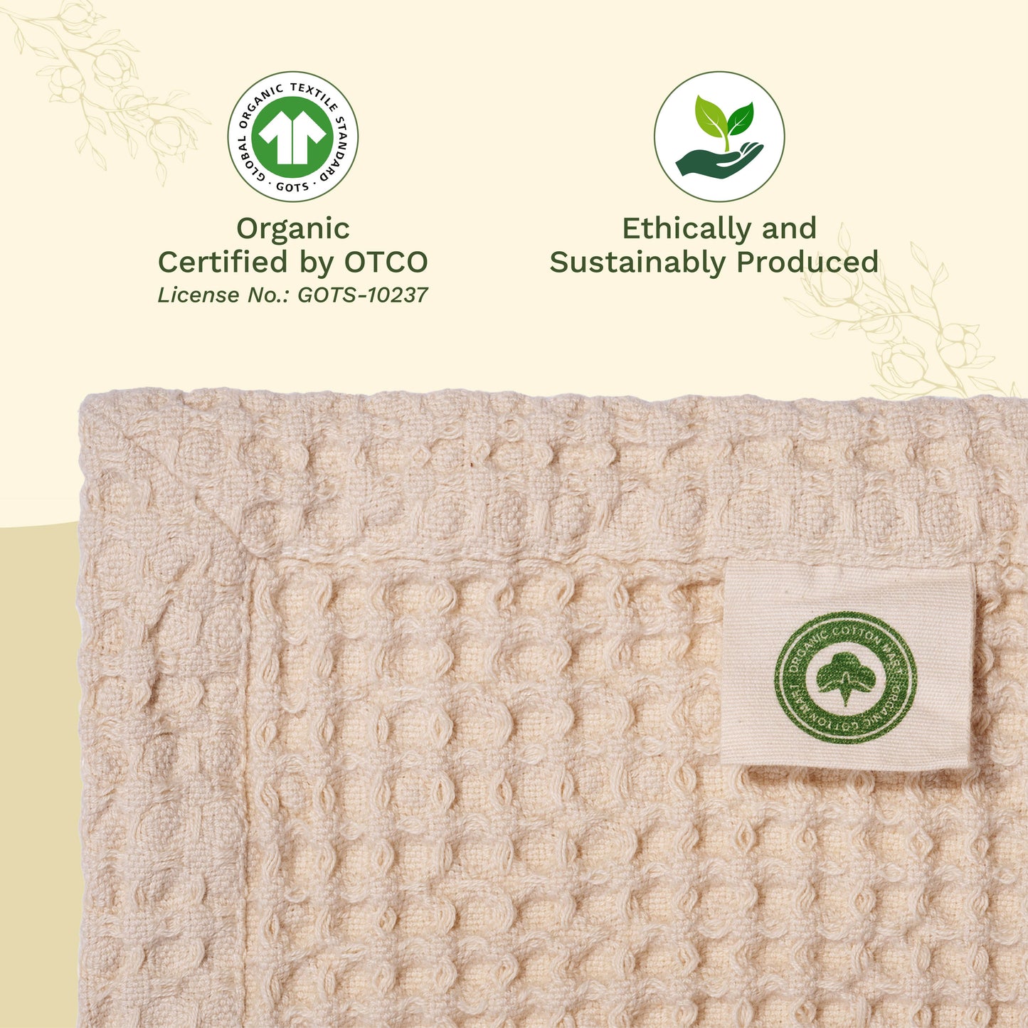 Close-up of waffle weave fabric showing dimensional grid texture in natural cotton