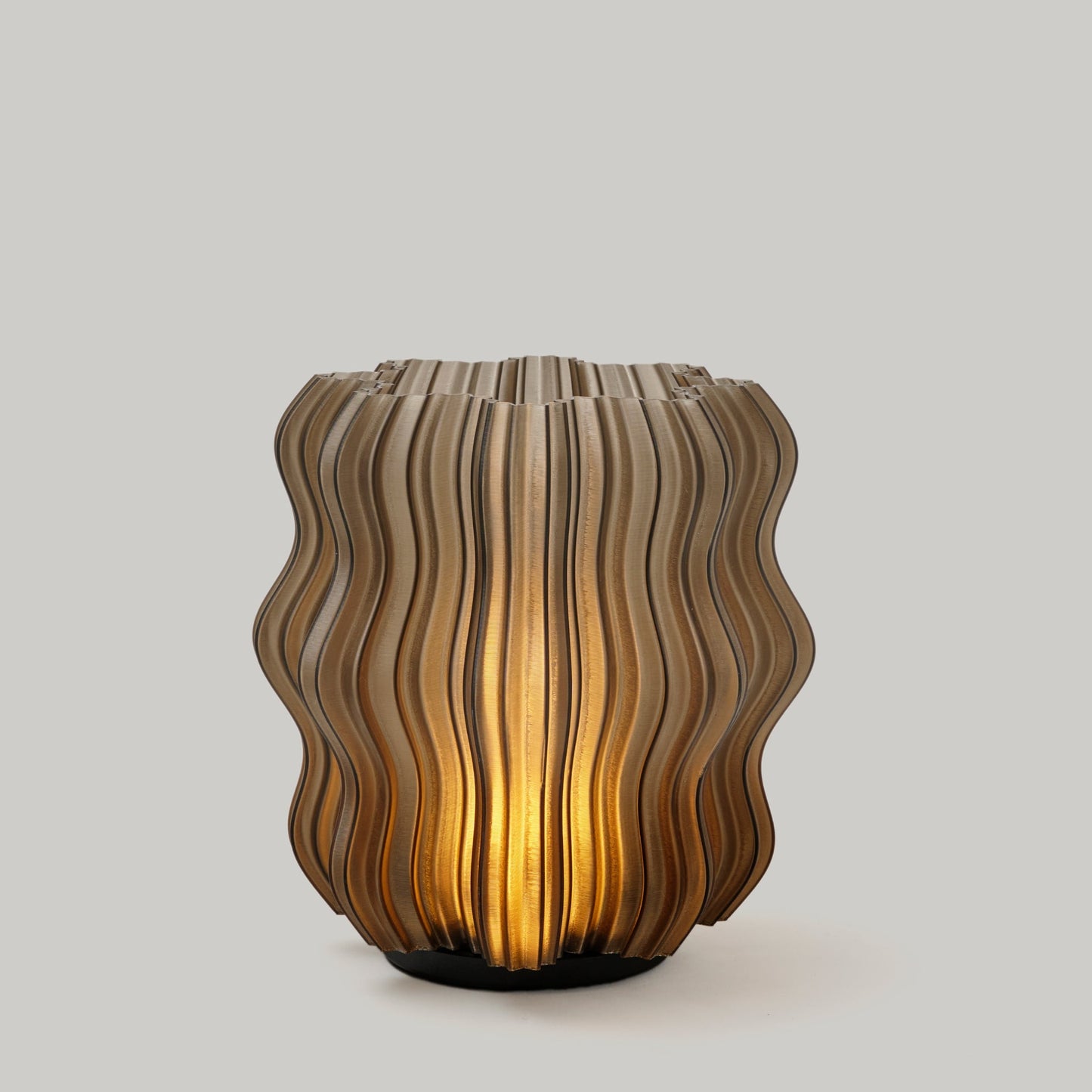 Mini Wavy Lamp in white color photographed on plain studio background