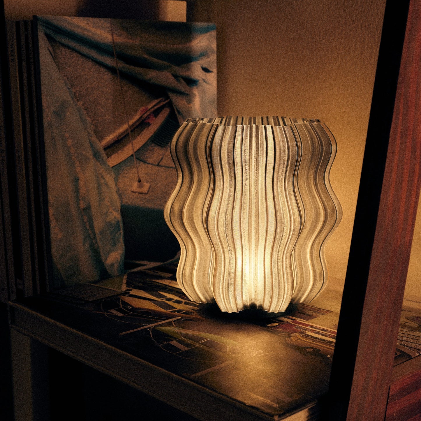 Mini Wavy Lamp in pink color on plain studio background