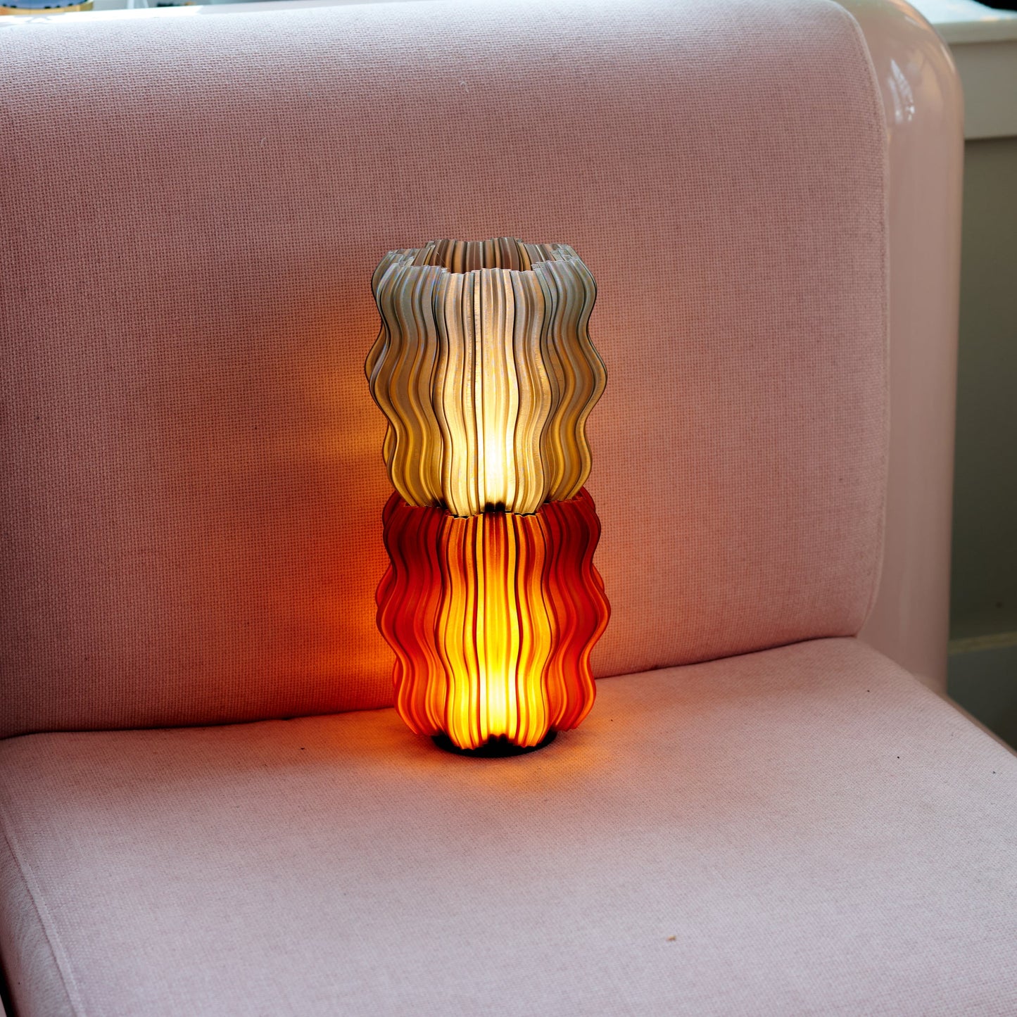 Mini Wavy Lamp in yellow color on plain studio background