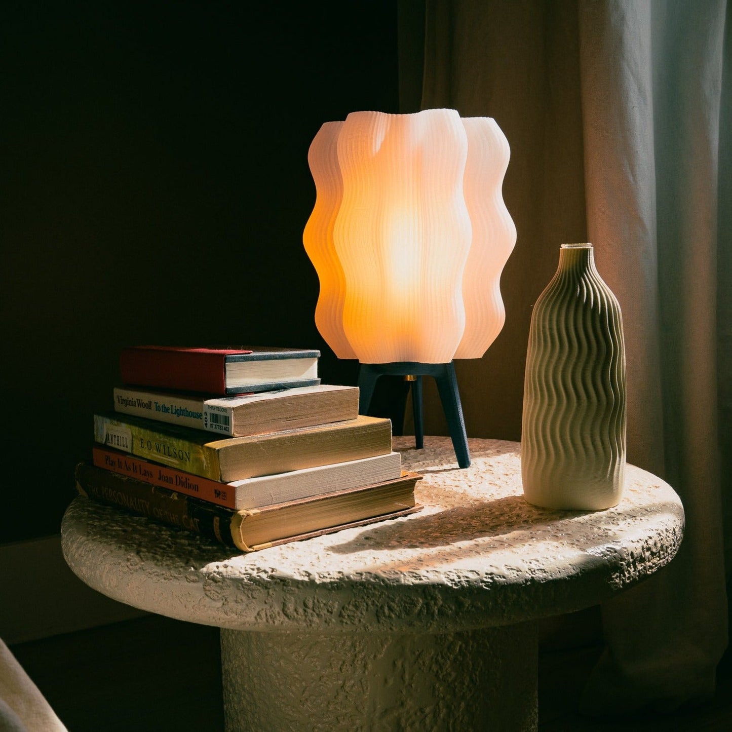Closeup of Wavy Lamp ribbed silhouette and warm illuminated glow