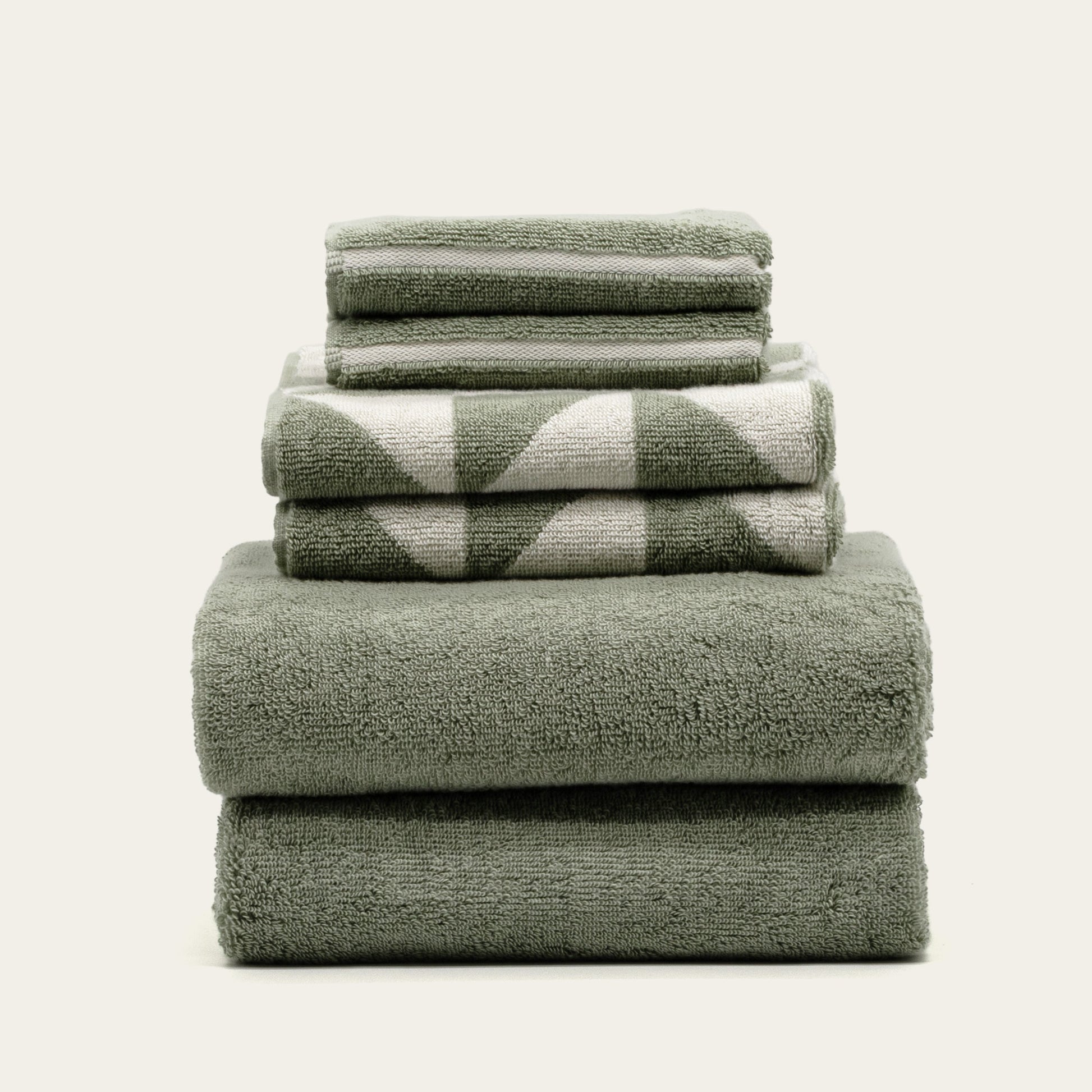 Deia standard towel set folded together showing sizing options