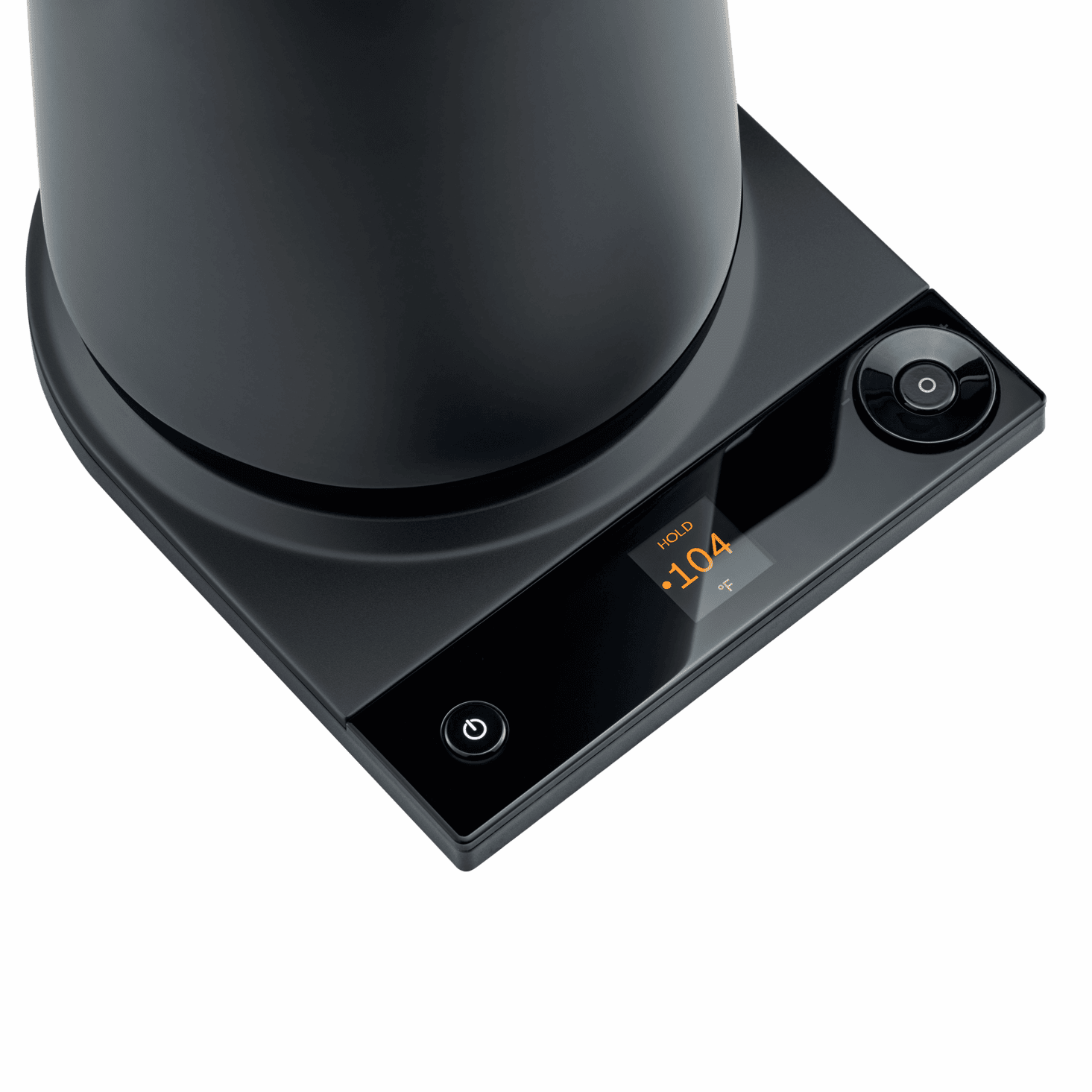 Luna Pro kettle pouring hot water into a pour-over coffee dripper