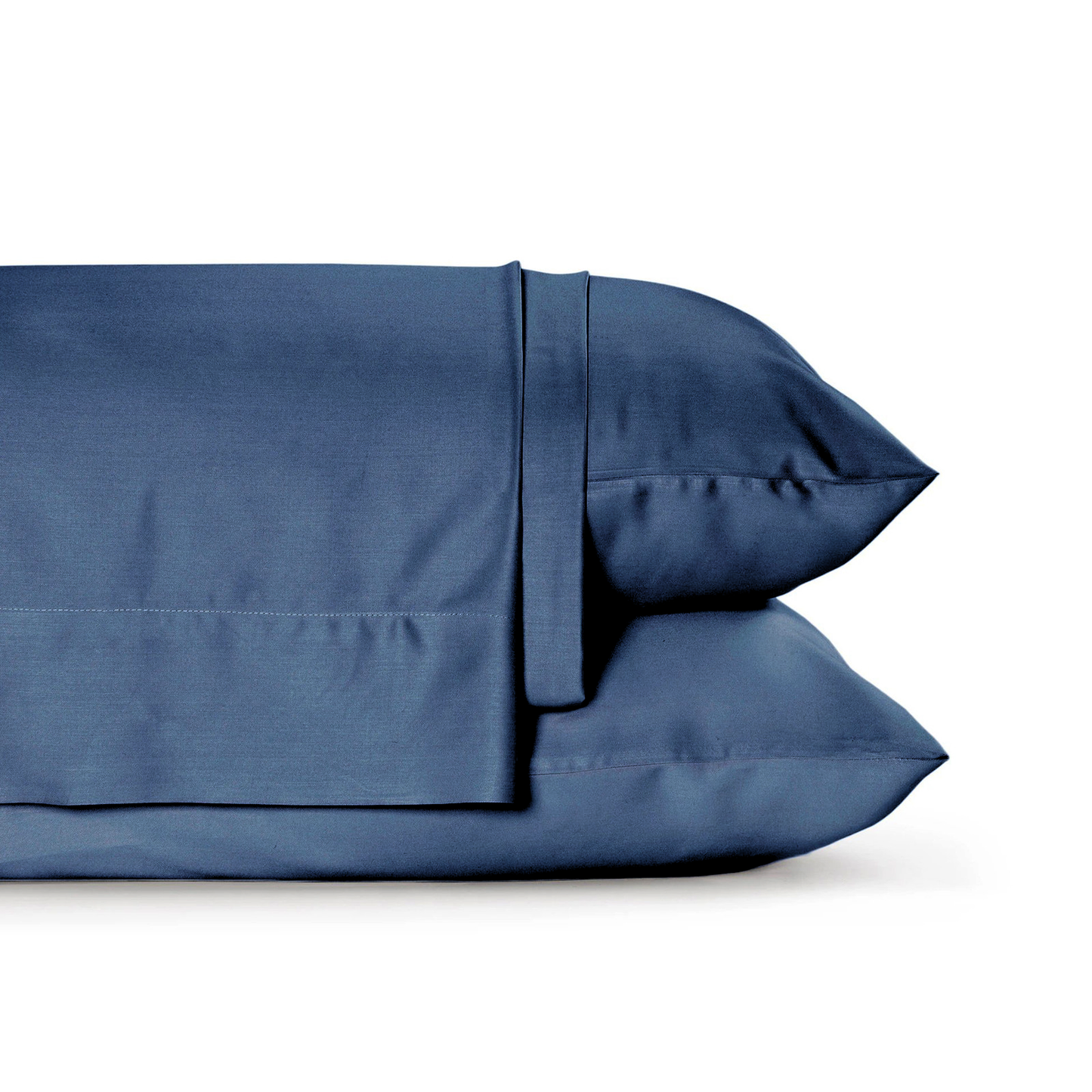 Bamboo viscose flat sheet styled on neatly made bed with pillows