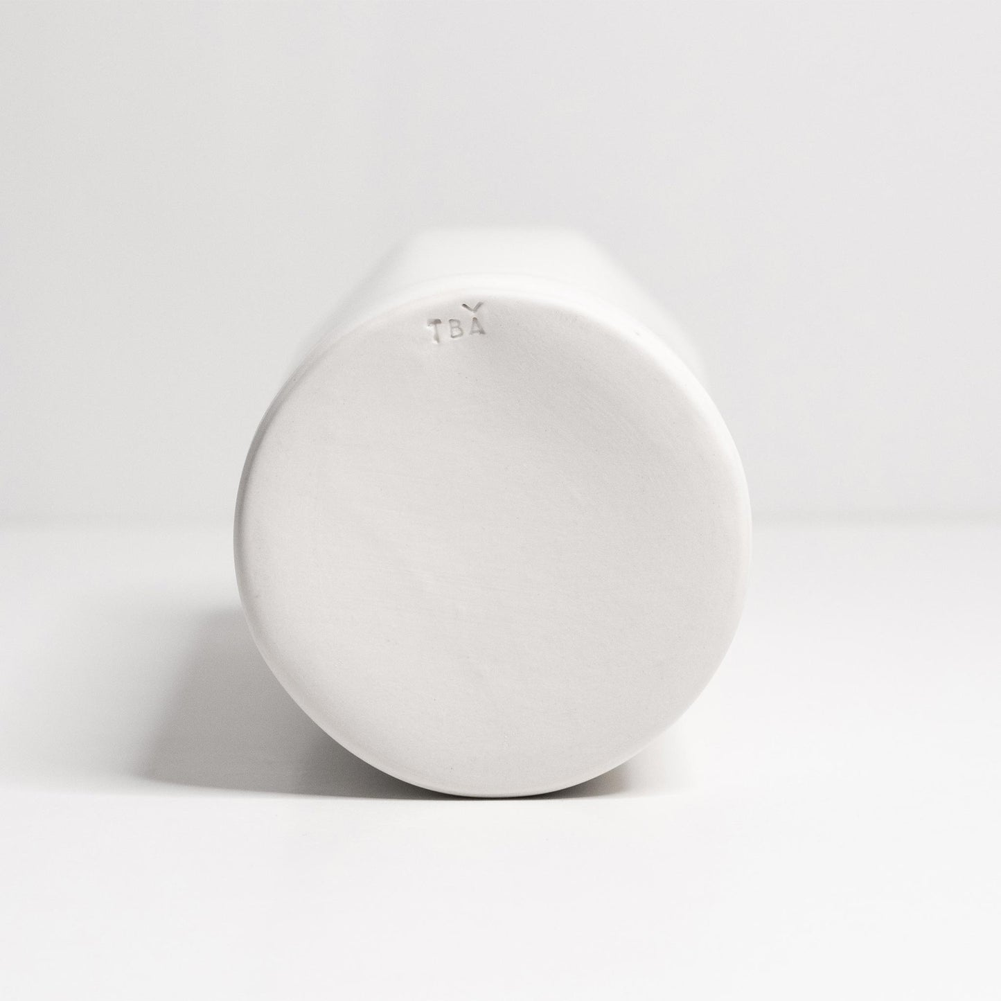 Bloom Vase profile view showing curved bulbous handmade ceramic shape