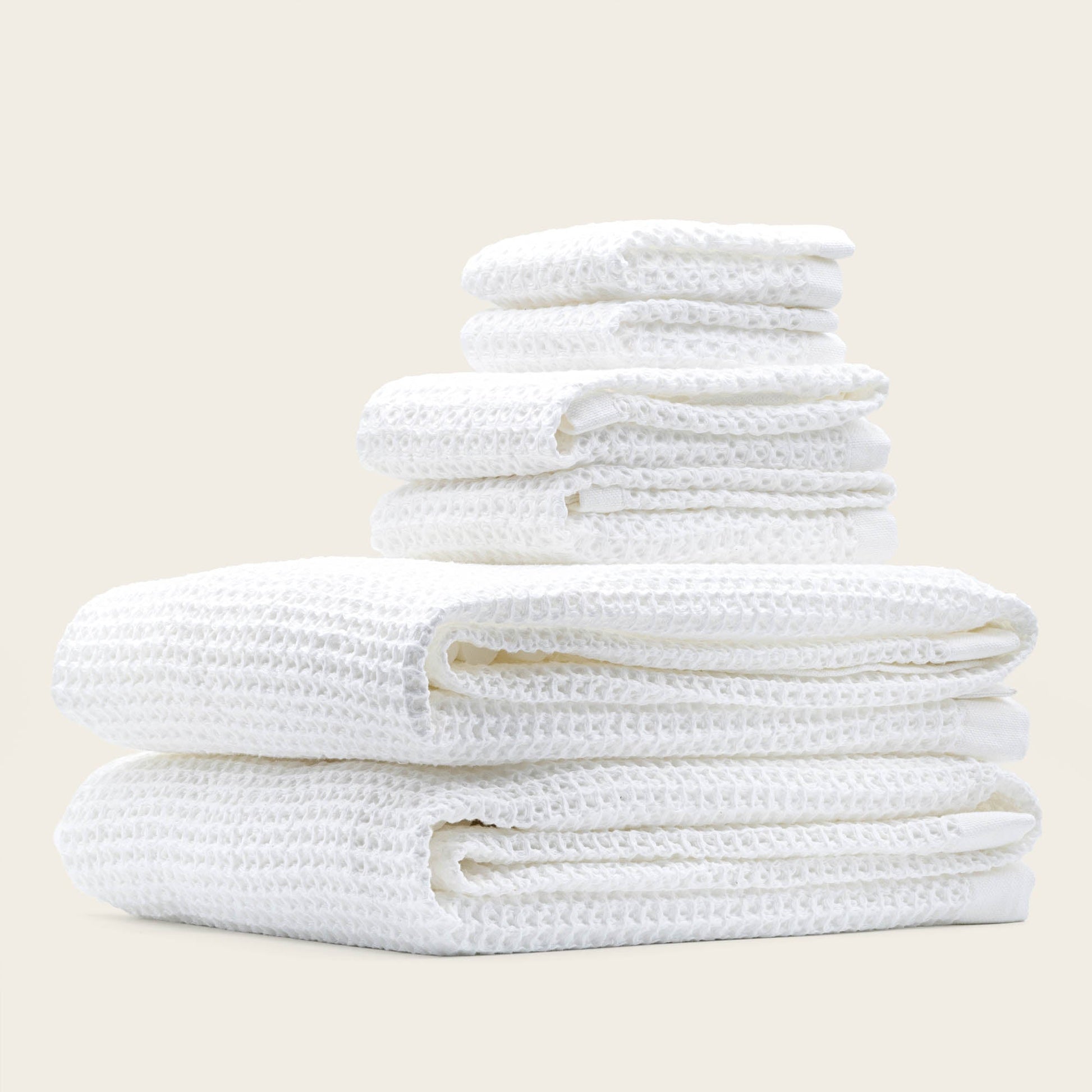 Sedona waffle towels in sand tan color photographed on plain background