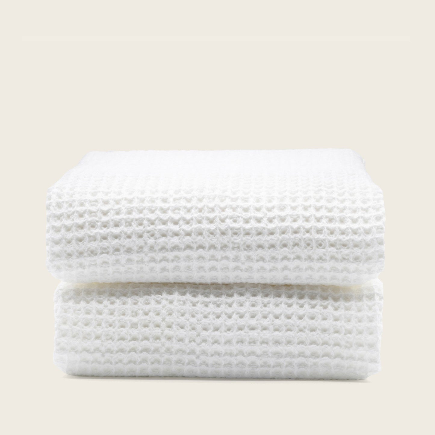 Sedona waffle hand towel folded with finished hem detail closeup