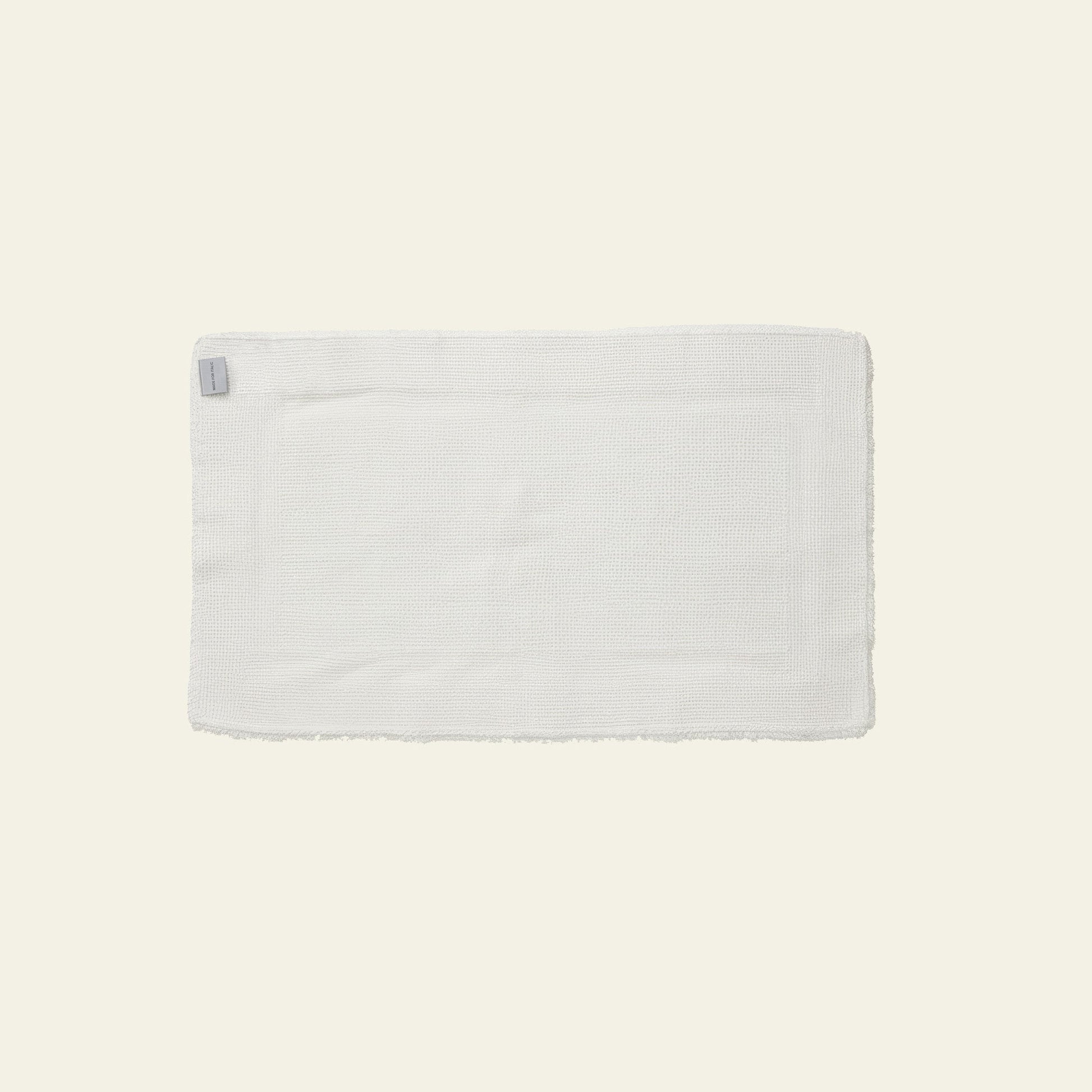 Bath mat in stone gray color photographed flat on plain background
