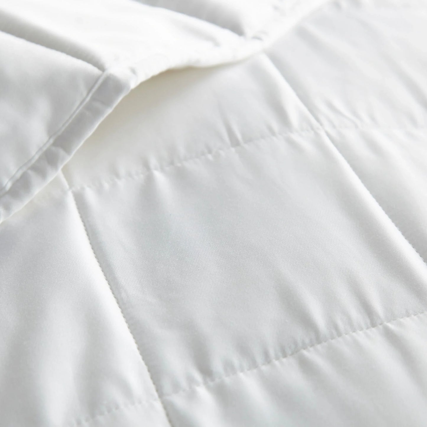 Bamboo duvet comforter in king size styled in light bedroom with linen pillows