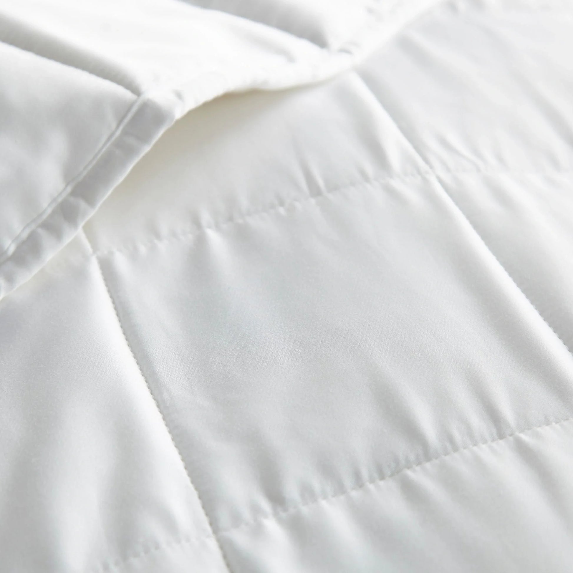 Bamboo duvet comforter in king size styled in light bedroom with linen pillows