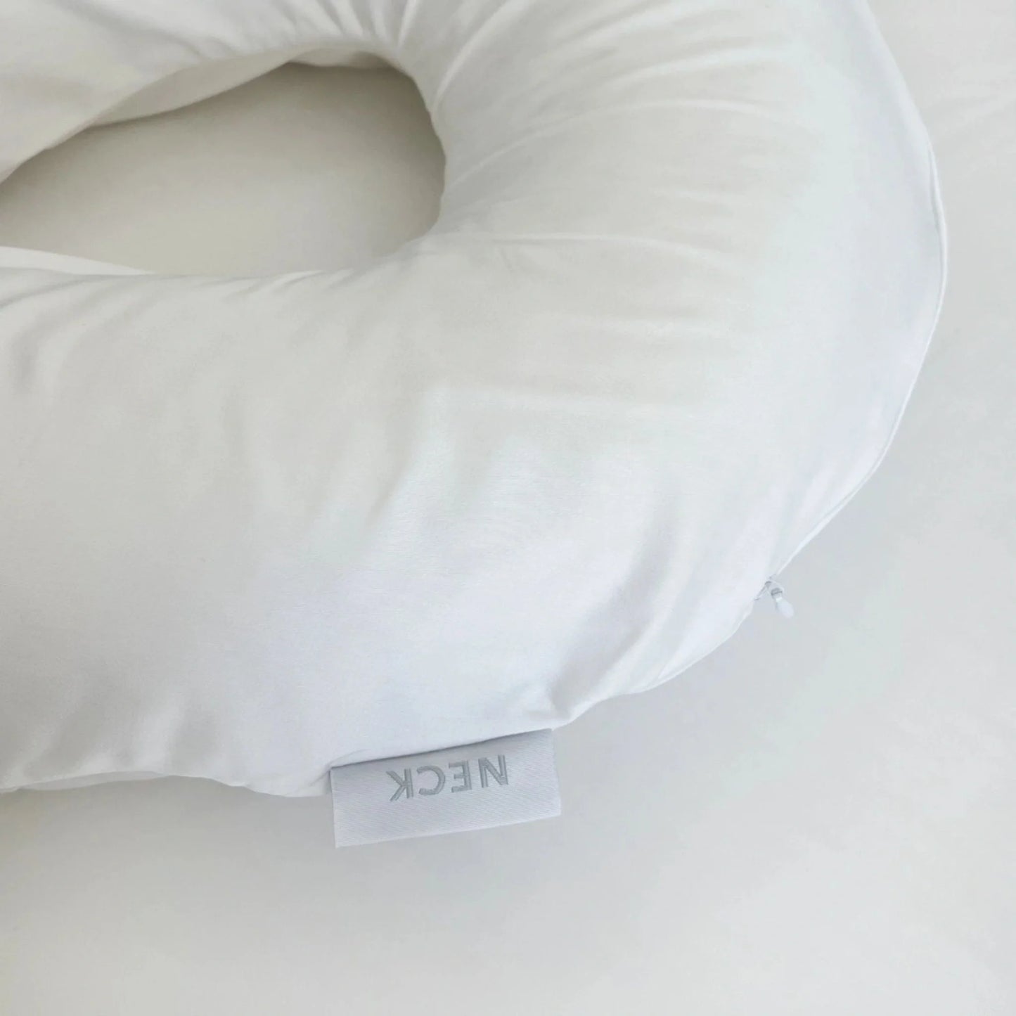 Travel size bamboo pillowcase shown flat on plain studio background