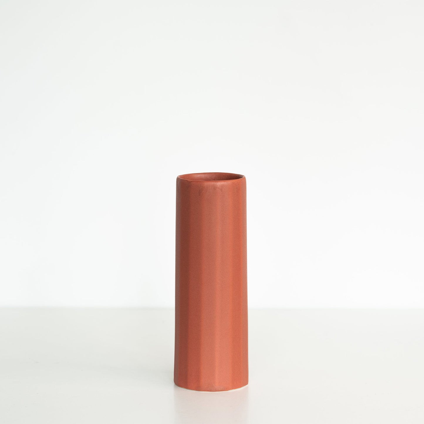 Bloom Vase in soft natural light highlighting smooth porcelain surface finish