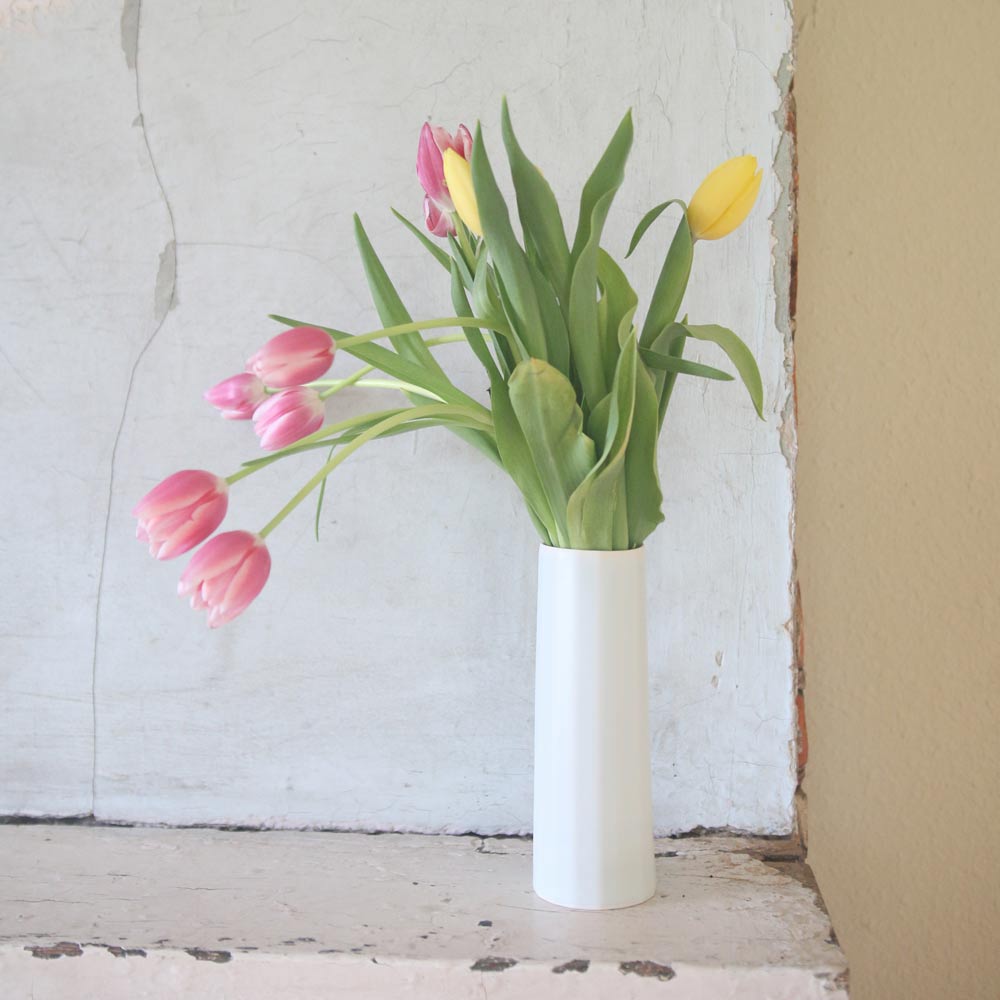 Lifestyle photo of Bloom Vase on dining table beside fresh florals