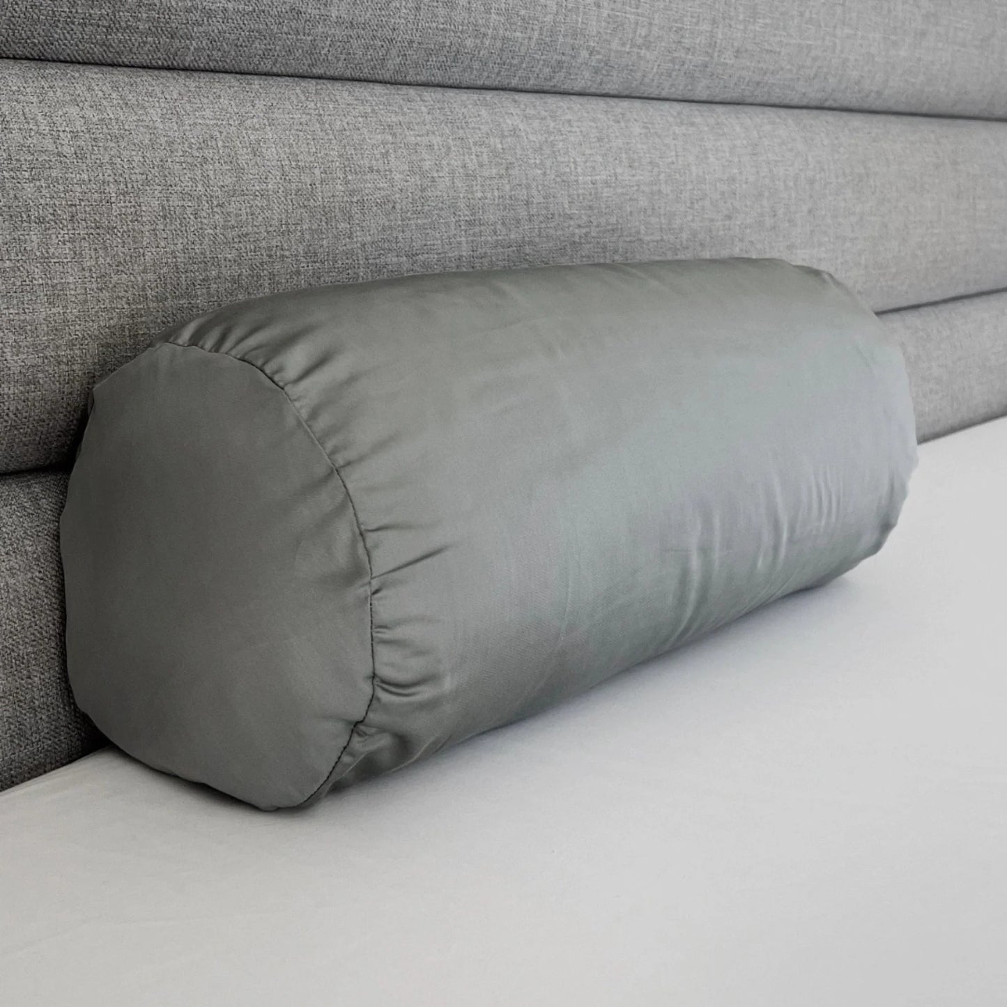 Bamboo pillowcase set in soft gray color photographed on plain background