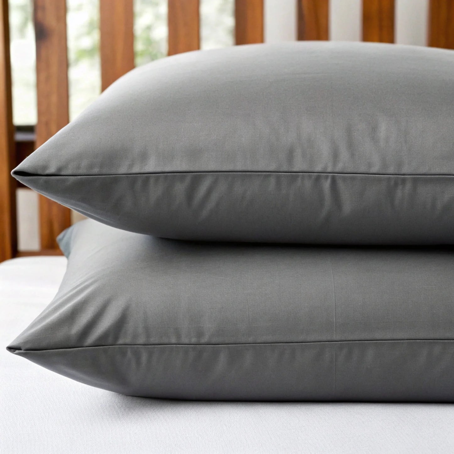 Copper-infused bamboo pillowcase in soft gray color on plain background