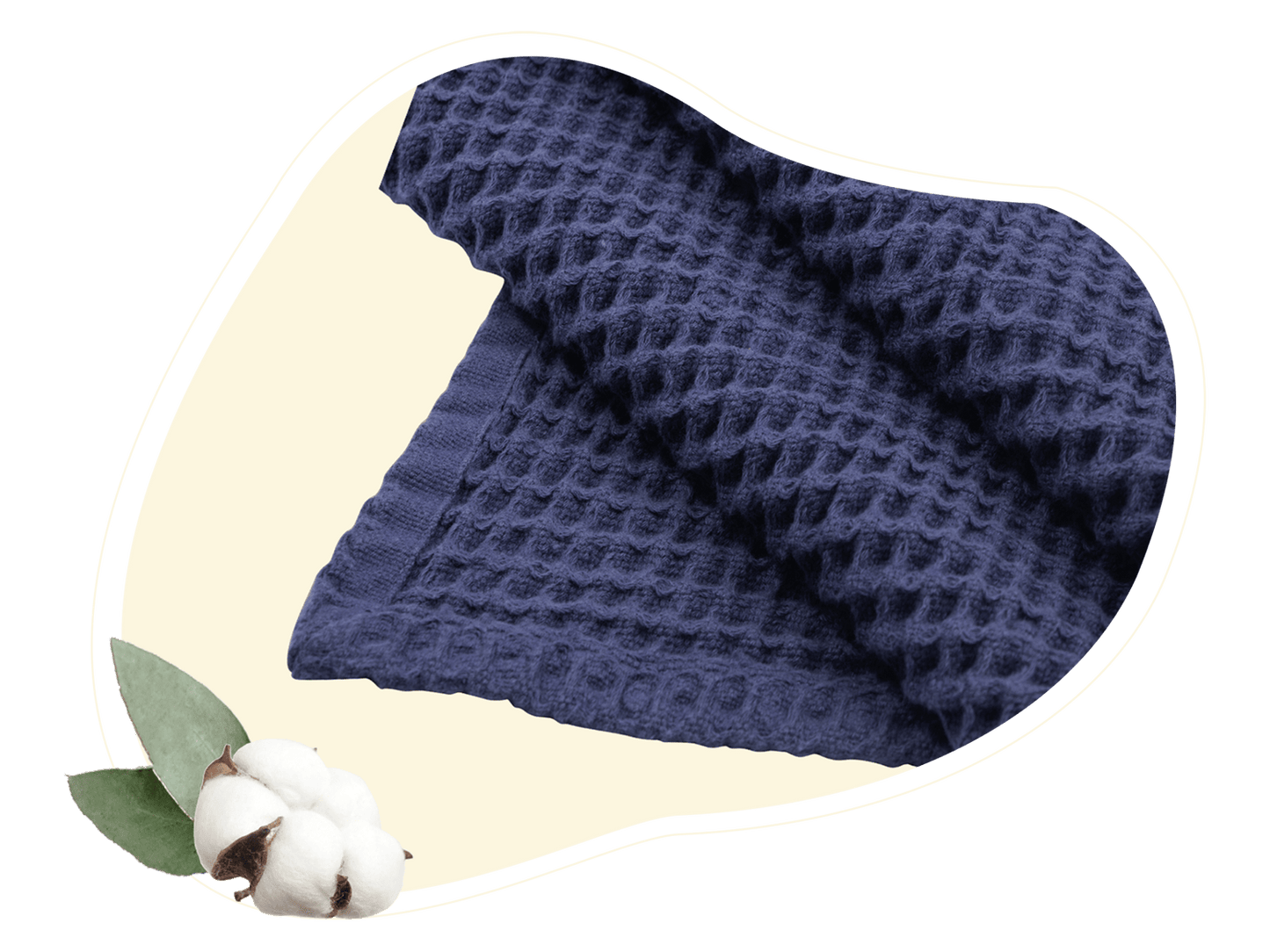 Close-up of waffle weave cotton fabric showing dimensional grid texture and natural fibers