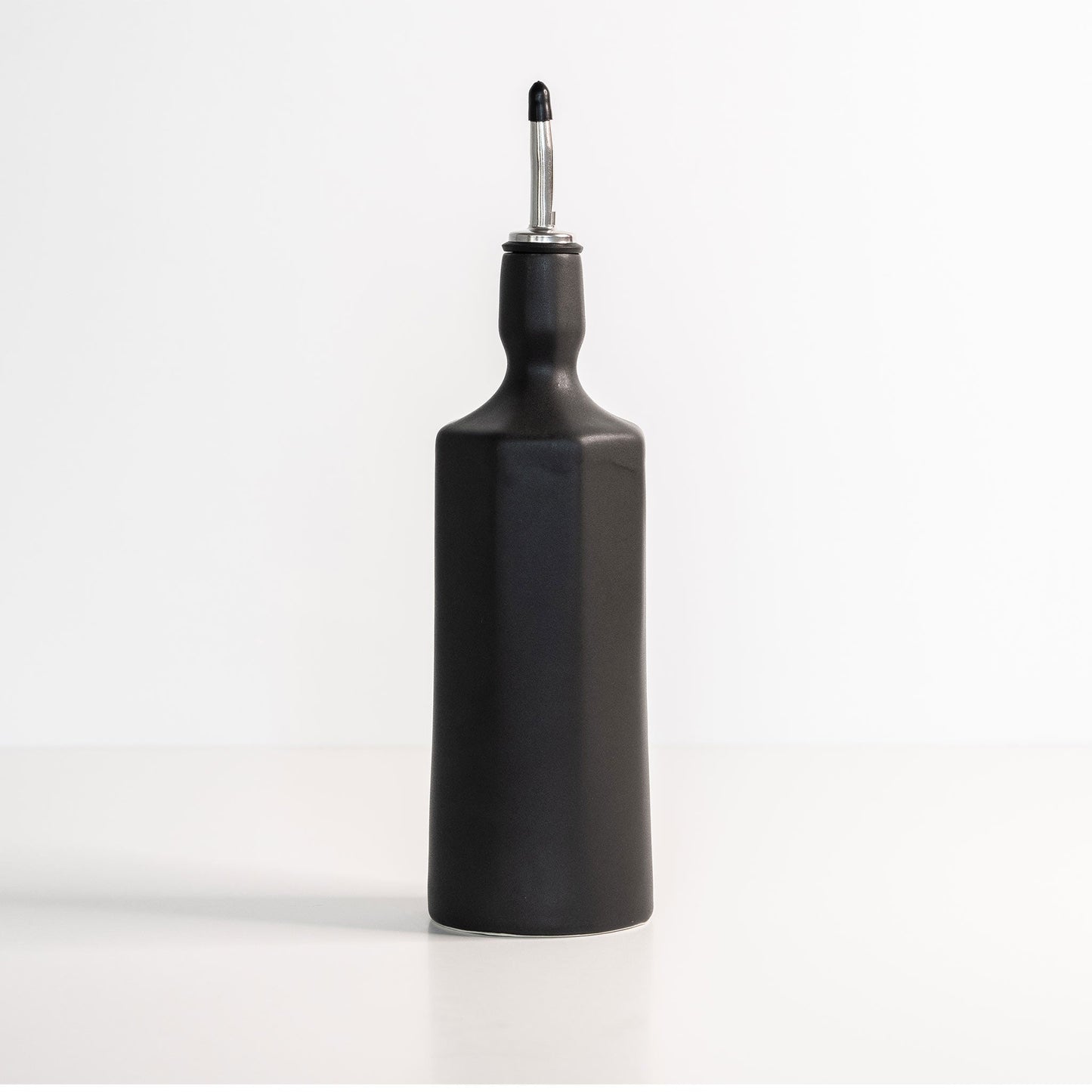 Two Elixir dispensers paired together for olive oil and vinegar service