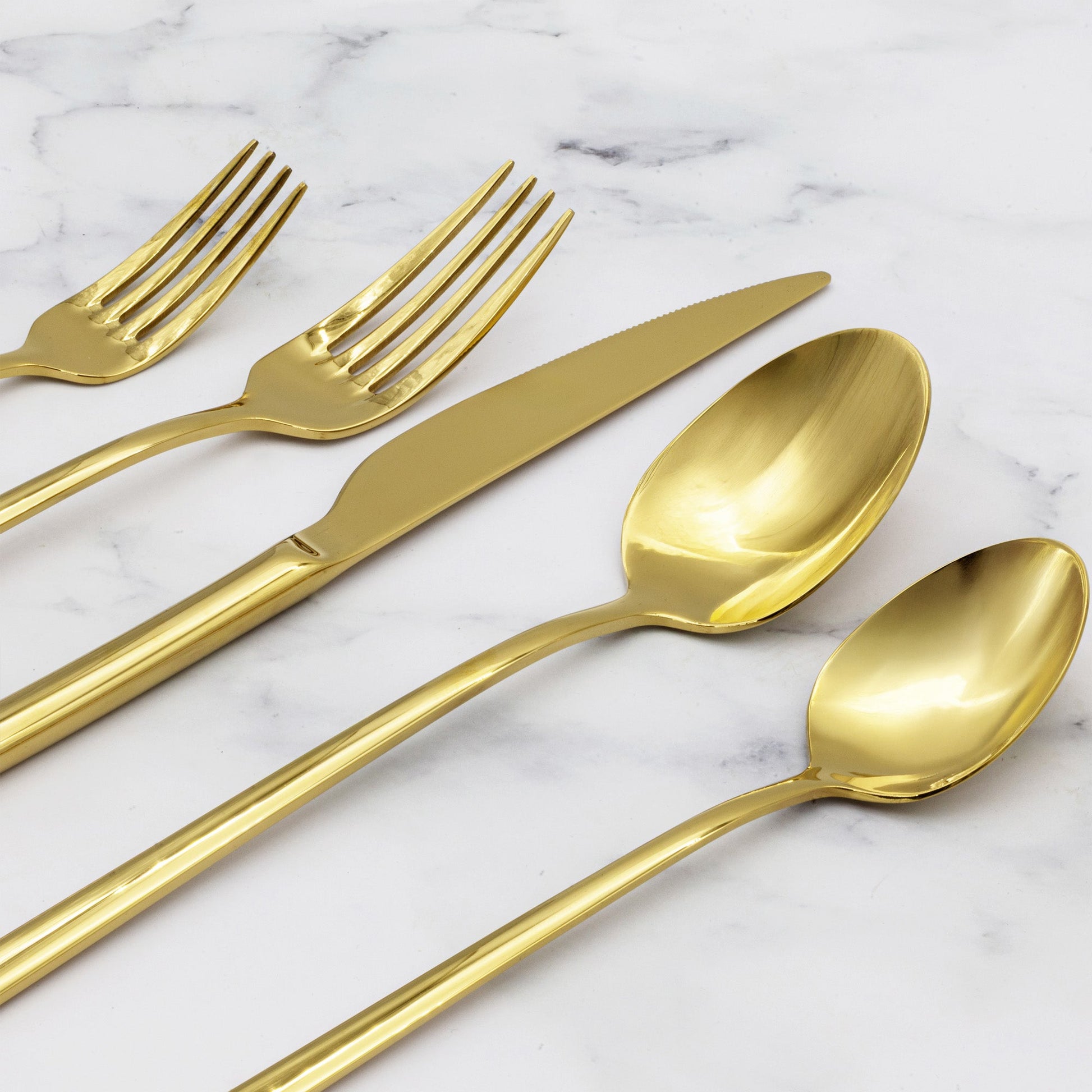 Place setting using Emilia flatware on linen napkin with ceramic plate