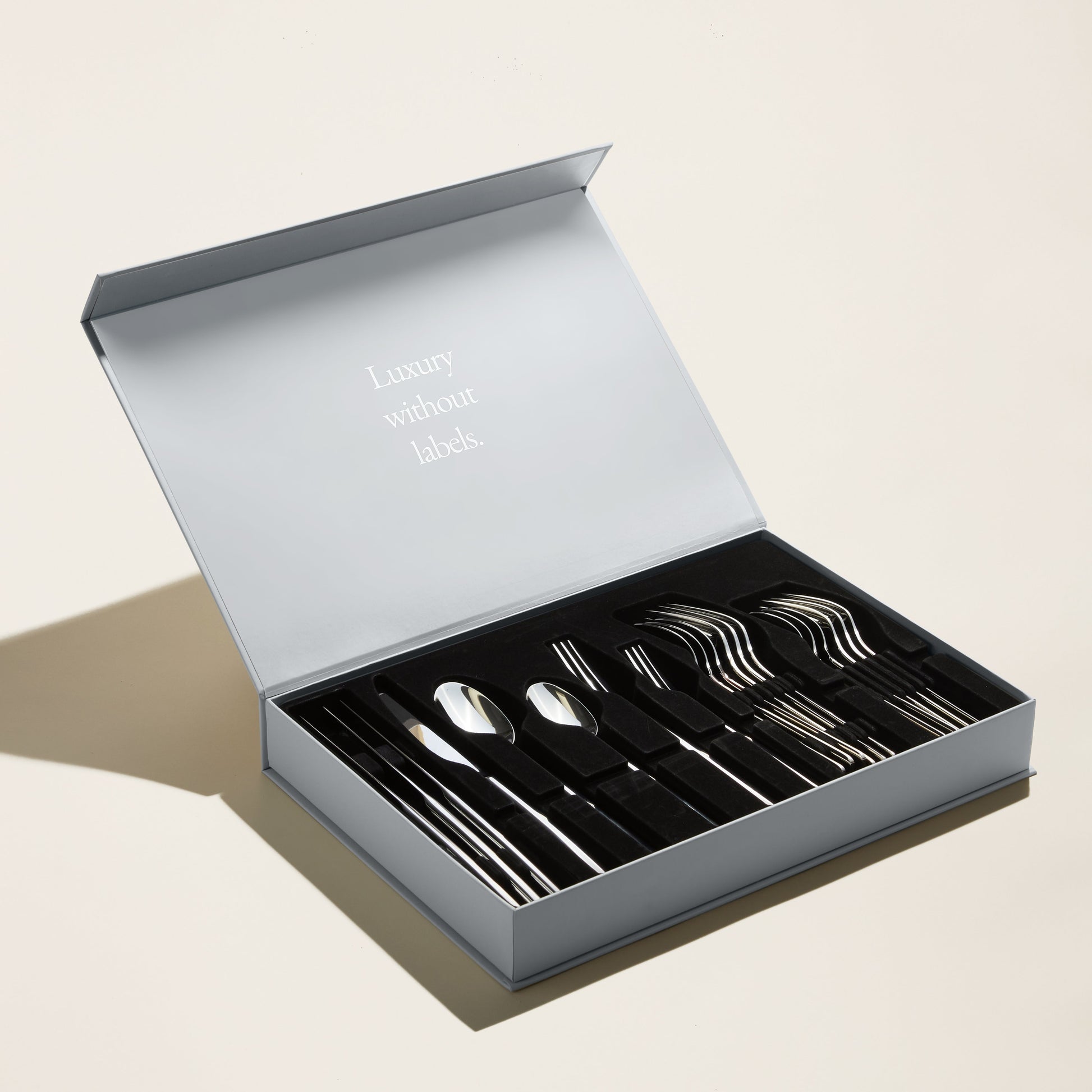 Closeup of Emilia flatware handle showing balanced tapered design profile