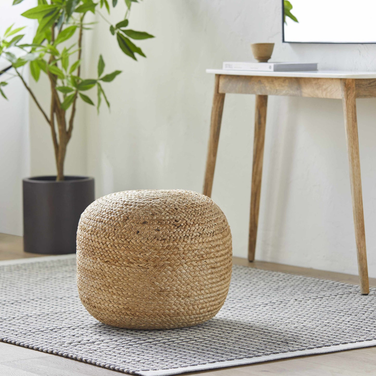 Closeup of Kaumakani pouf chunky hand-knit jute texture detail