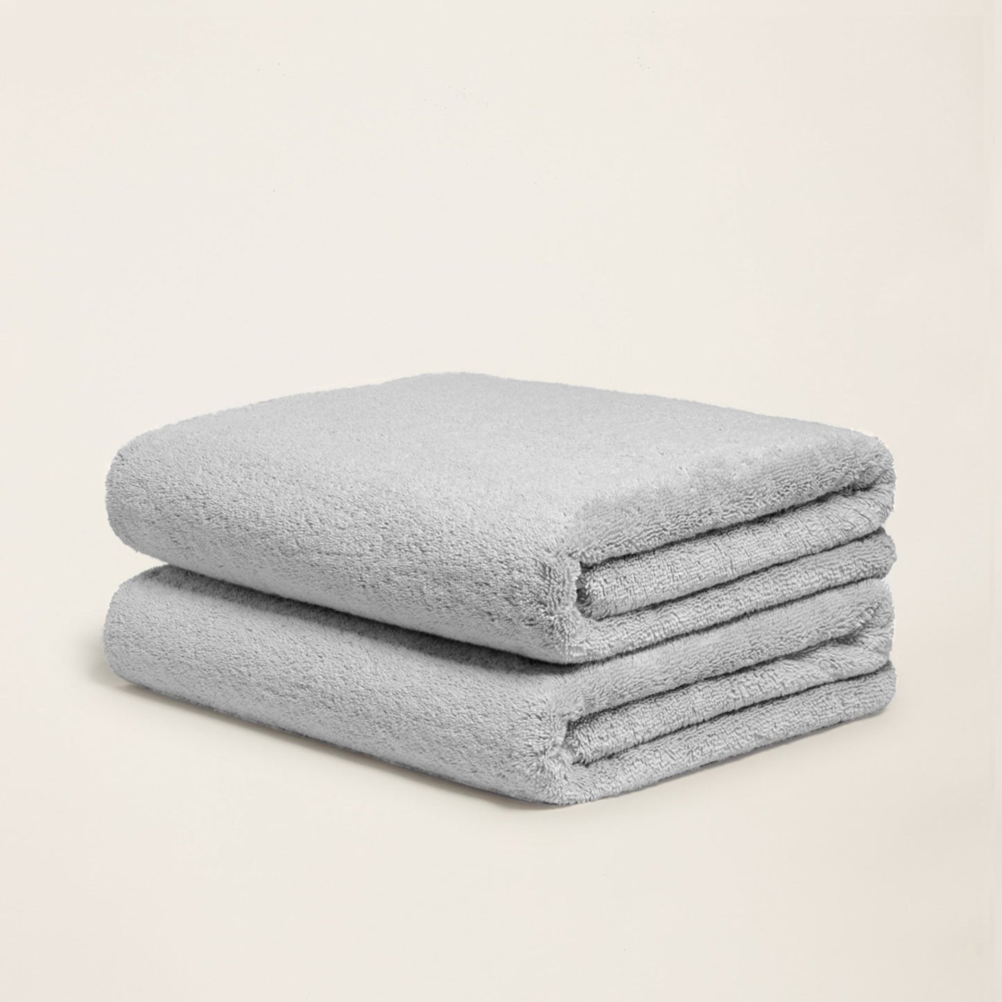 Ultraplush hand towels neatly displayed alongside soap on stone counter