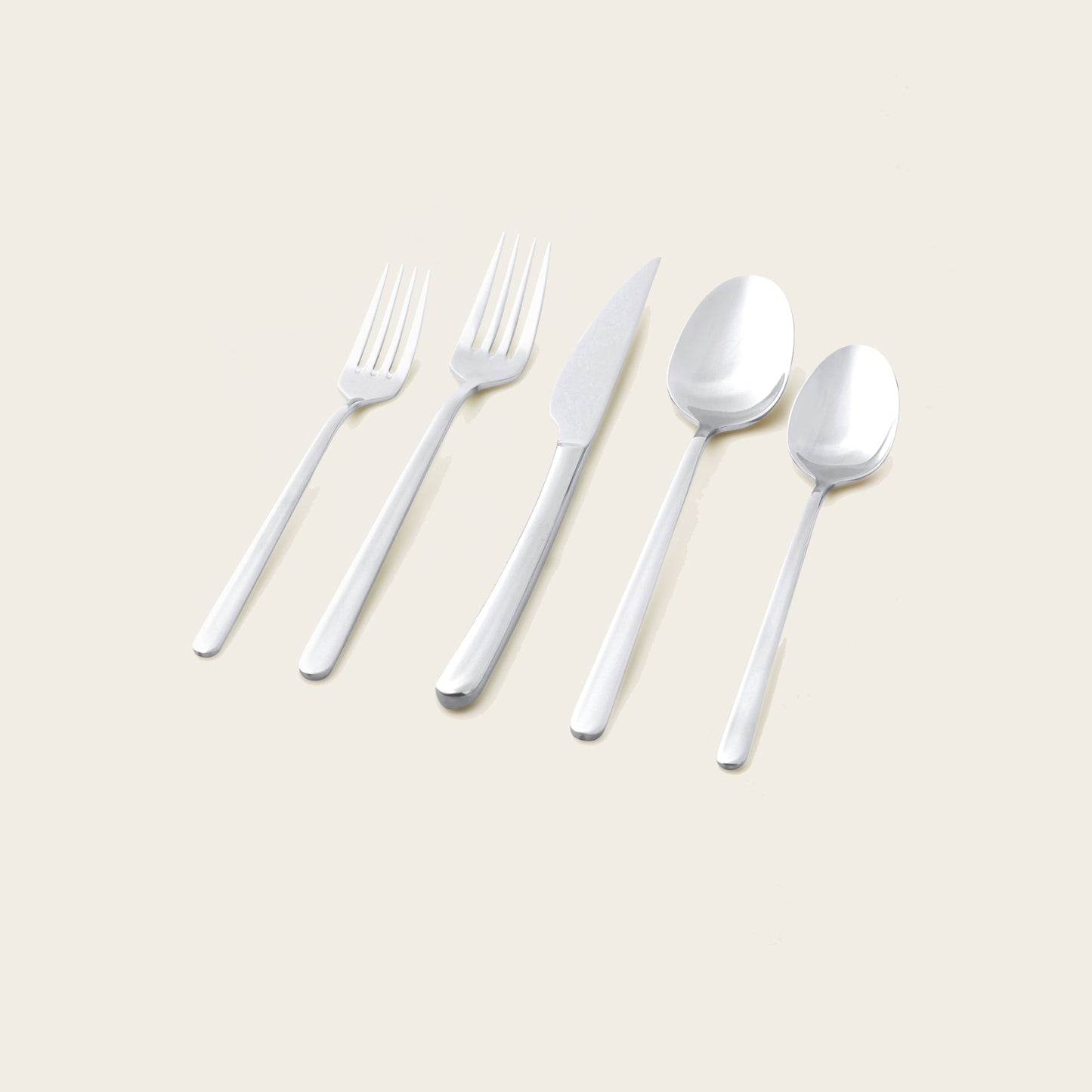Emilia flatware on rustic wood table with seasonal entertaining tableware