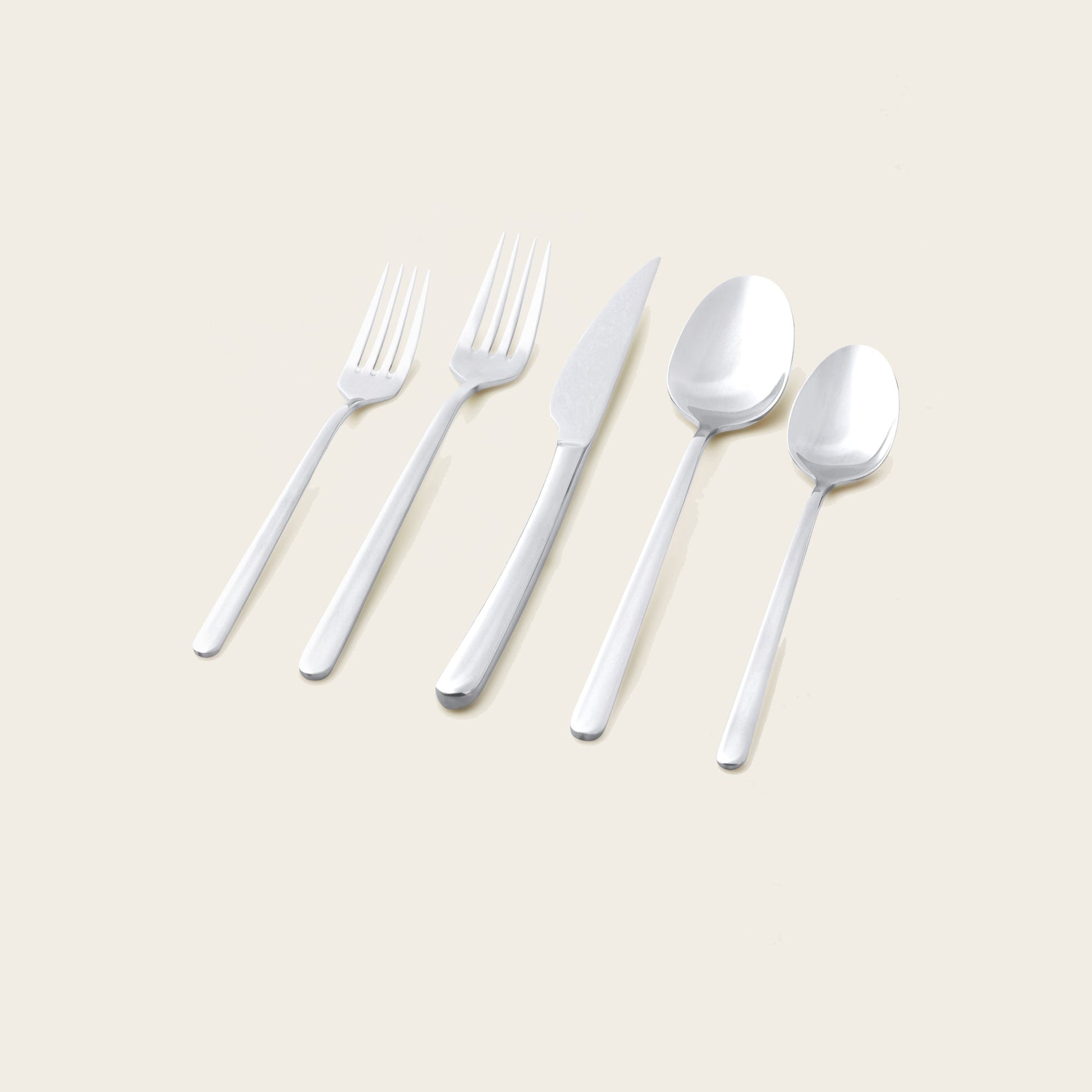 Emilia flatware on rustic wood table with seasonal entertaining tableware